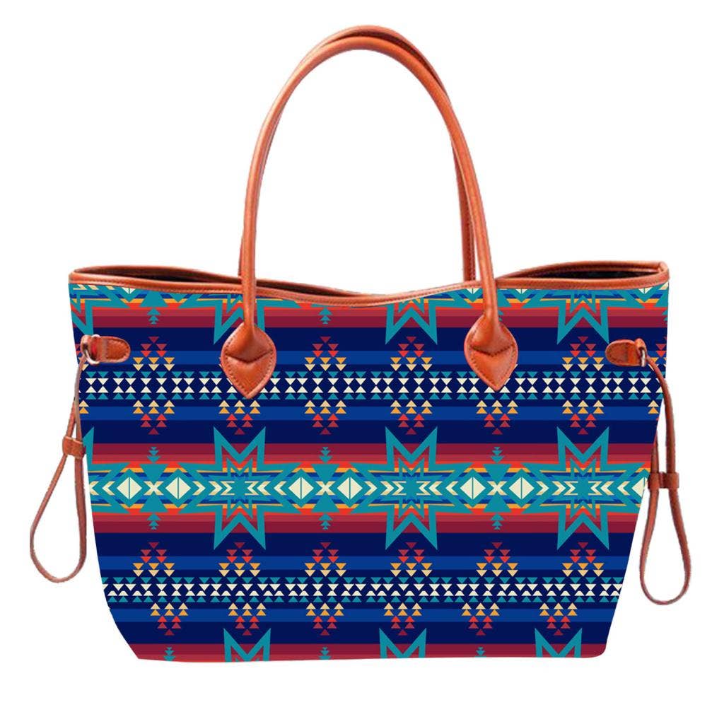 Colorful patterned tote bag with brown handles on a white background