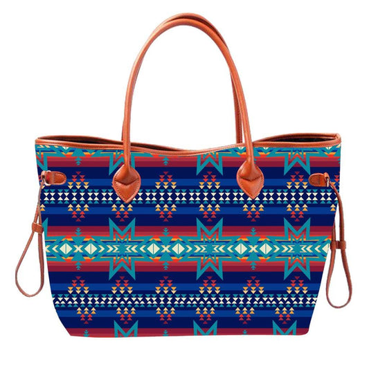 Colorful patterned tote bag with brown handles on a white background