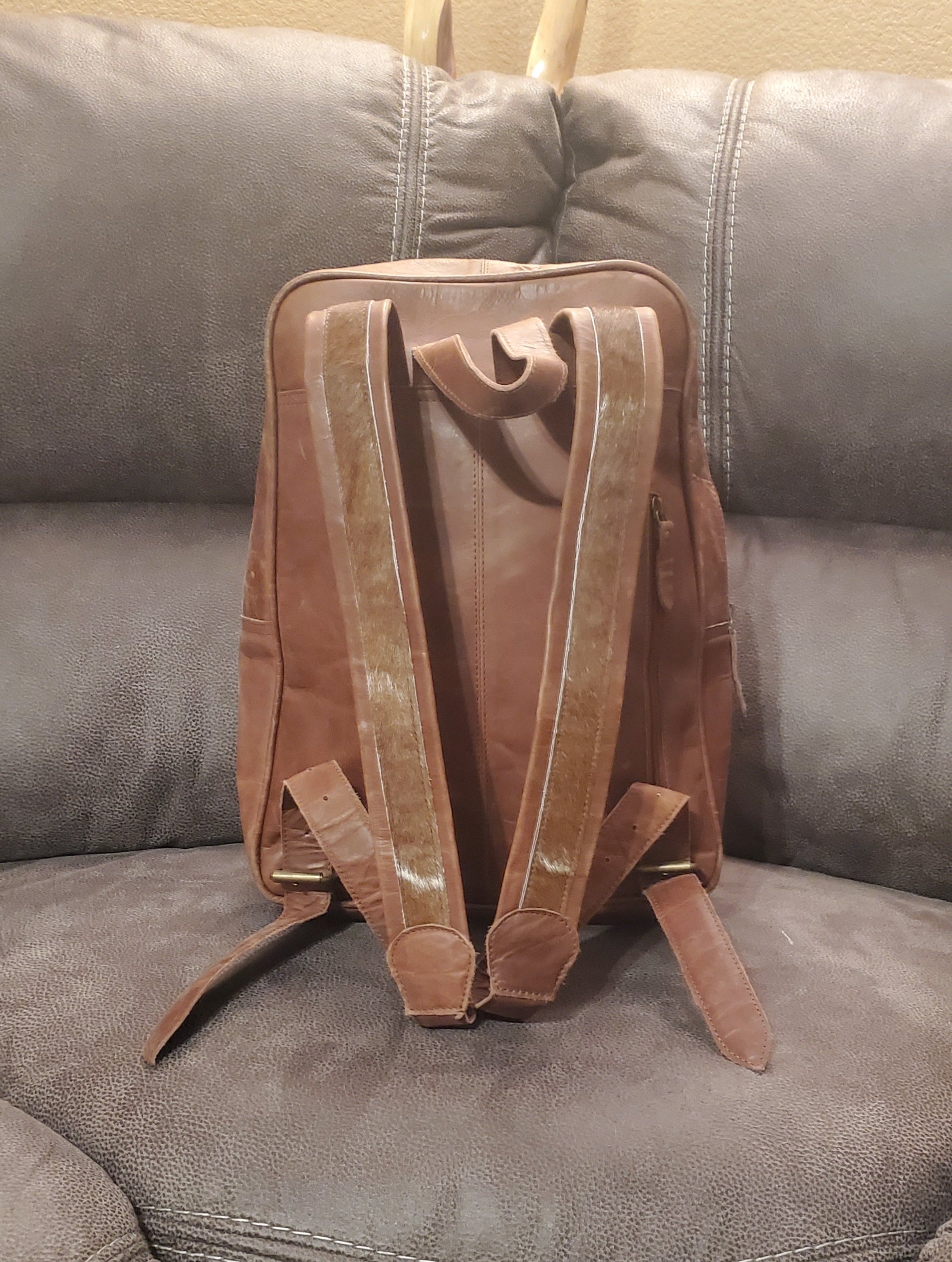 Cowhide & Steer Tooled leather backpack